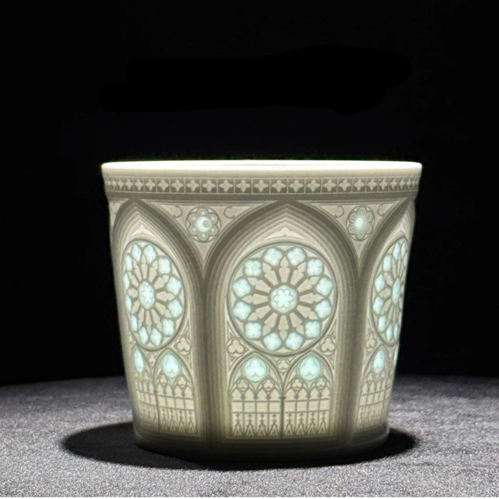 Rose-window linglong detail on the Jingdezhen porcelain coffee cup