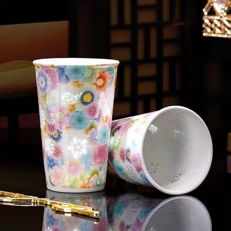 High-white clay Jingdezhen mug with pierced linglong decoration