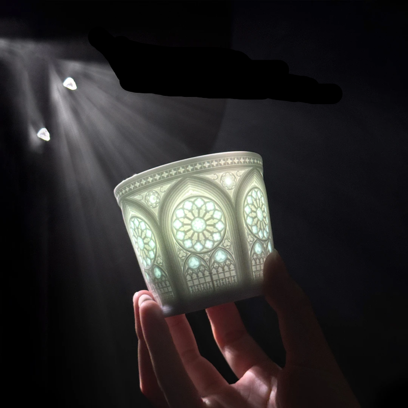 Translucent pierced rose-window coffee cup from Jingdezhen