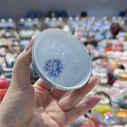 Side view of the Jingdezhen blue-and-white enamel tea cup with silver inlay