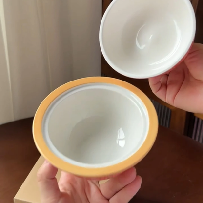 Side view of the apple-shaped ceramic stew pot with lid