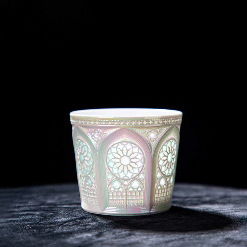 Side view of the Jingdezhen linglong rose-window coffee cup