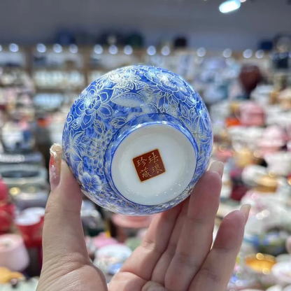 Angled view of the Jingdezhen blue-and-white porcelain tea cup with enamel color